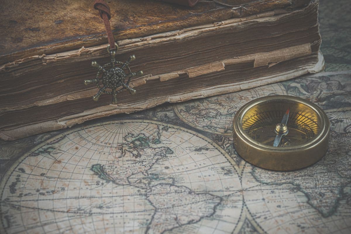 Compass over a forex trading candlestick chart