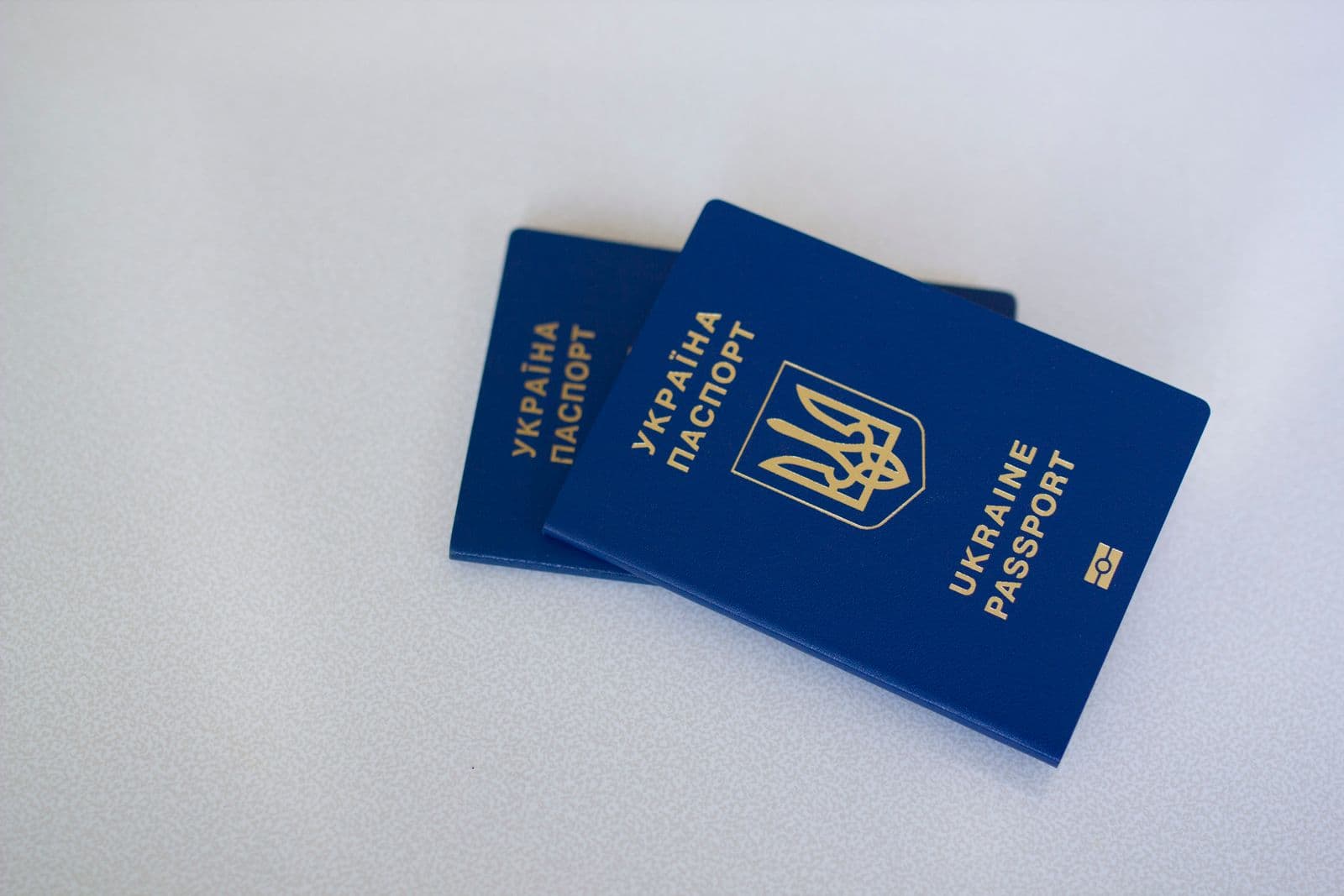 Non-resident business owner holding a passport