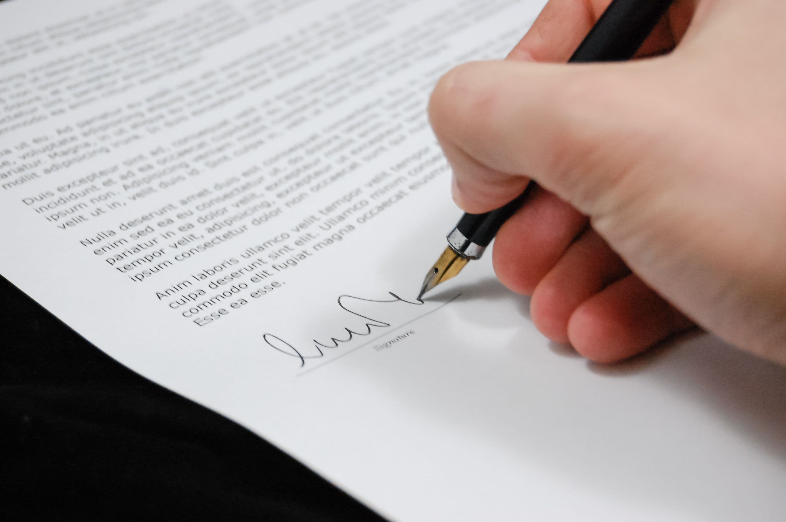 A desk with documents and a stamp, symbolizing official bank confirmations